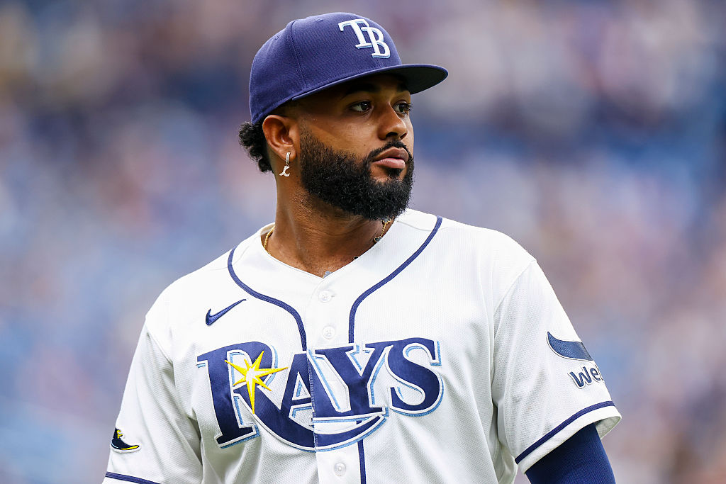ST PETERSBURG, FLORIDA - JUNE 28: Junior Caminero walks off the field after the top of the seventh inning against the Arizona Diamondbacks at Tropicana Field on June 28, 2026 in St Petersburg, Florida.