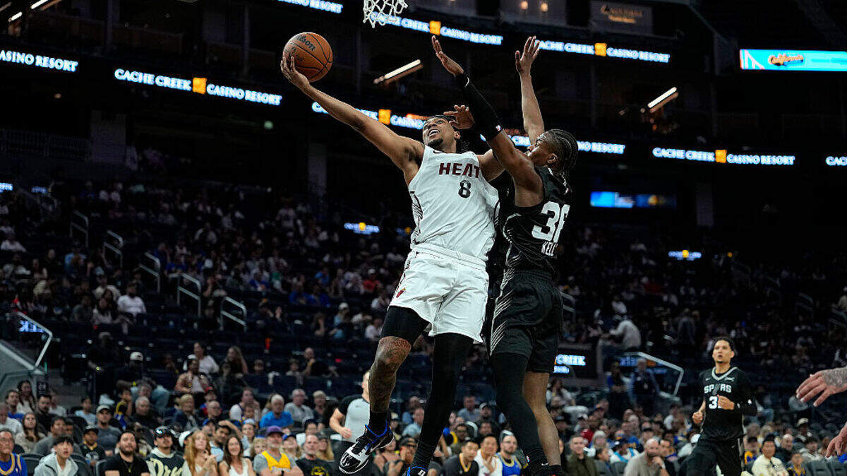 Trevor Keels #8 of the Miami Heat drives to the basket on Miles Kelly #36 of the San Antonio Spurs during the first half in the California Classic a NBA Summer League game at Chase Center on July 03, 2026 in San Francisco. Trevor Keels #8 of the Miami Heat drives to the basket on Miles Kelly #36 of the San Antonio Spurs during the first half in the California Classic a NBA Summer League game at Chase Center on July 03, 2026 in San Francisco.