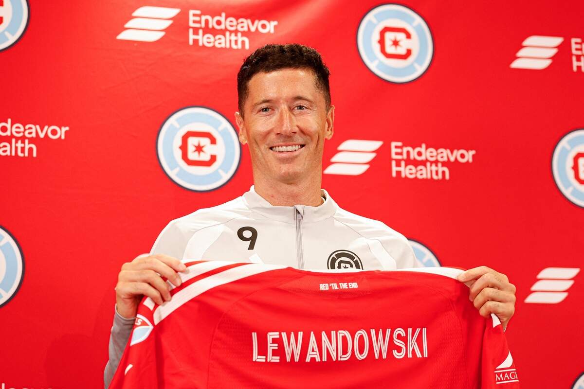 Polish forward #09 Robert Lewandowski is officially introduced during the press conference as a newest member of the Chicago Fire FC at Endeavor Health Performance Center ahead of his MLS debut in Chicago, Illinois, on July 14 2026. Poland's all-time leading goal scorer Robert Lewandowski has signed a contract through the 2027-28 campaign with the Chicago Fire, the Major League Soccer club announced in late June 2026. The 37-year-old striker arrives from Barcelona after helping the Spanish giants capture the La Liga crown last month having starred from 2014-2022 with Bayern Munich. (Photo by KAMIL KRZACZYNSKI / AFP via Getty Images)