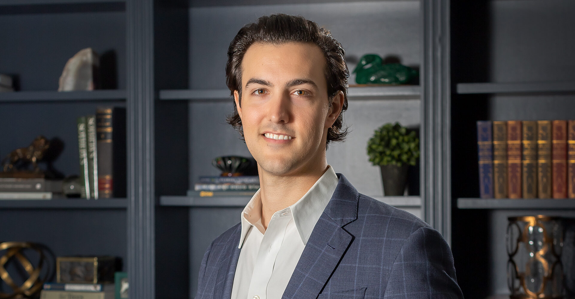 Garrett Greco, a Tampa real estate broker and host of the Tampa Bay Developer podcast, poses for a portrait.