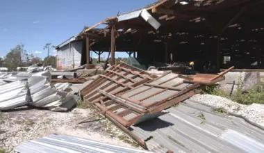 A wall toppled by Hurricane Helene in 2024.