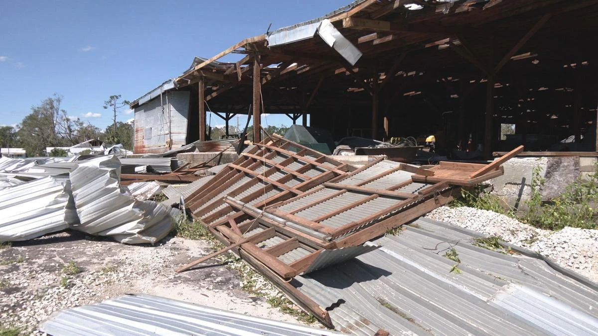 A wall toppled by Hurricane Helene in 2024.