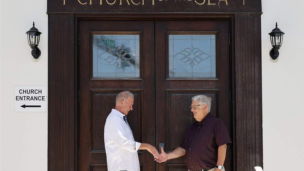Church By The Sea treasurer Harry Rozelle, left, and senior pastor Brian Checchio, came together to raise funds for the church to build a living seawall, which will help combat the pollution in the waterway by the church. Church By The Sea treasurer Harry Rozelle, left, and senior pastor Brian Checchio, came together to raise funds for the church to build a living seawall, which will help combat the pollution in the waterway by the church.