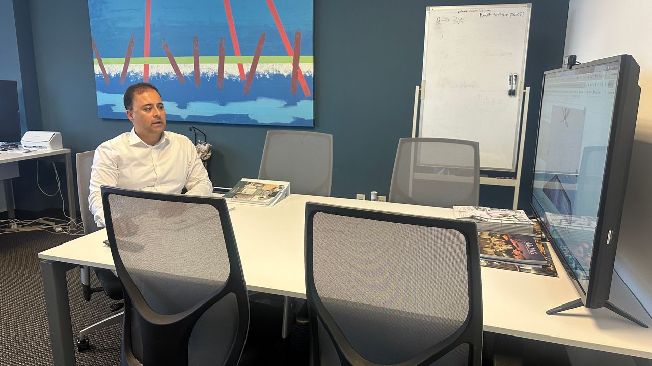Central Florida real estate agent Ali Partovi said rising housing costs can put additional pressure on homeowners who were already close to the limit of what they could afford. (Spectrum News)