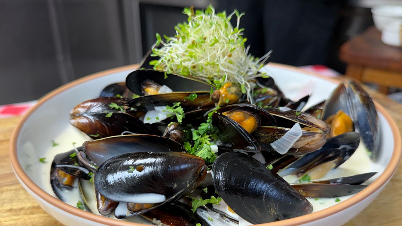 Moules Marinières: a traditional French treatment of mussels. Photo by Virginia Johnson/Staff