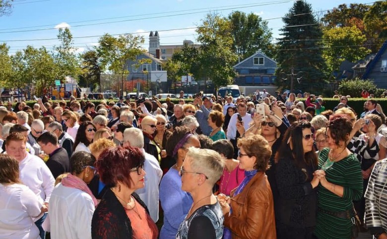 A large crowd of women at Bride Pride, a mass marriage and vow renewal ceremony 