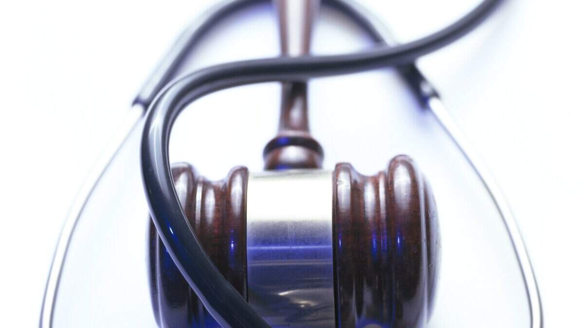Nurse suspended, charged with molesting Miami area child