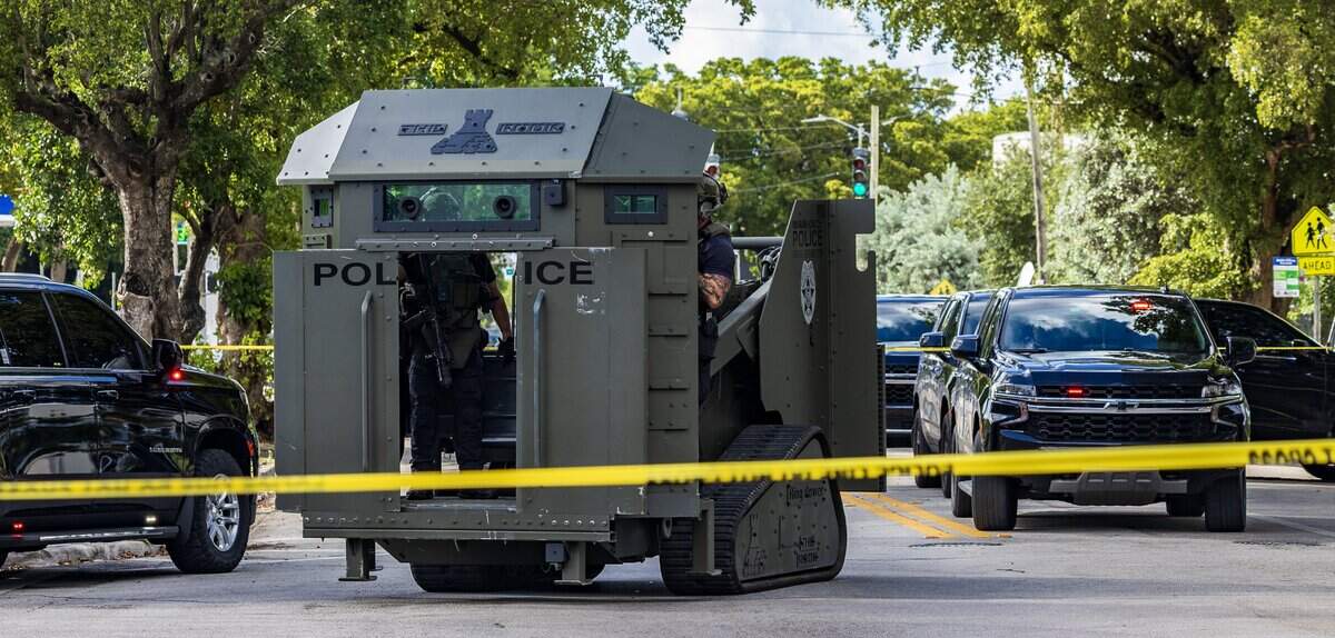 A police armored vehicle is seen as law enforcement responds to a shooting in Miami's Allapattah neighborhood on Thursday morning, Oct. 9, 2025. Authorities investigated the area between Northwest 14th and 15th avenues on 26th Street after two Miami police officers were shot and an armed man barricaded himself inside a house.