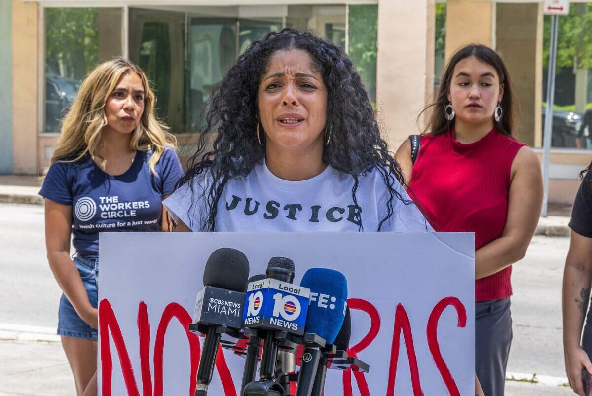 Anisley Cortez, the wife of Cuban migrant Noslen Cendra Gonzalez, speaks during a press conference in front of the Federal Detention Center (FDC) in Downtown Miami where he's being detained, to ask for him to be release, on Wednesday July 15, 2026.