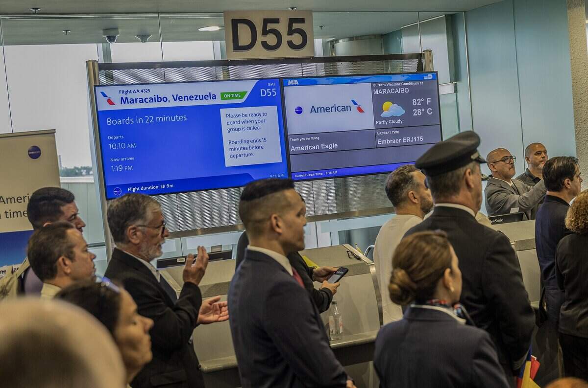 A group of dignitaries including the Miami Dade County and American Airlines executives joined together, during an event to celebrate the American Airlines' first departure from MIA to Maracaibo, Venezuela since the service was suspended in 2019, on Tuesday July 14, 2026.