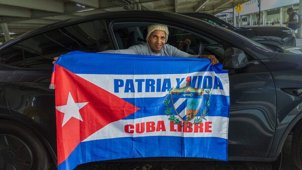 Photos: Freed Cuban political prisoner lands at Miami airport