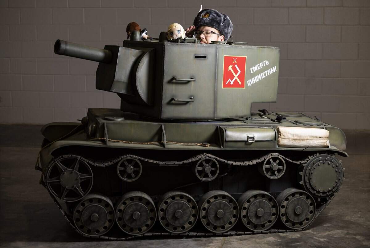 Ben Albert cosplays as KV-2 Tank from Girls Und Panzer during Florida Supercon 2026 at the Miami Beach Convention Center on Friday, July 10, 2026, in Miami Beach, Fla.