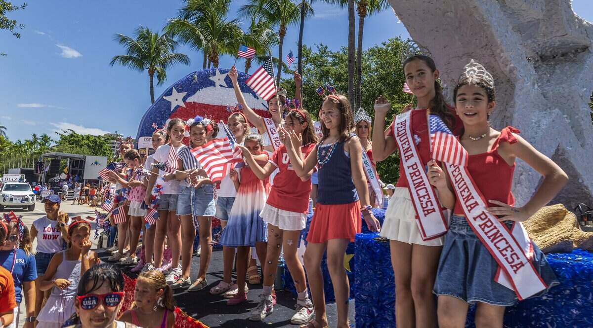 Girls scouts members greeted attendees from a float, during the 67th annual Key Biscayne Fourth of July parade celebrating the America's 250th and the 35th anniversary of the Village's birth as its own municipality, on Saturday, July 04, 2026.