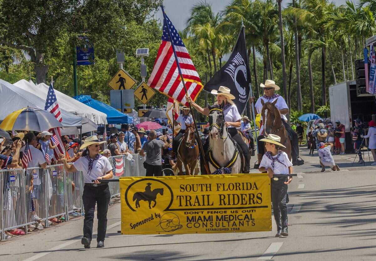 Members of the South Florida Trail riders marched during the 67th annual Key Biscayne Fourth of July parade celebrating the America's 250th and the 35th anniversary of the Village's birth as its own municipality, on Saturday, July 04, 2026.