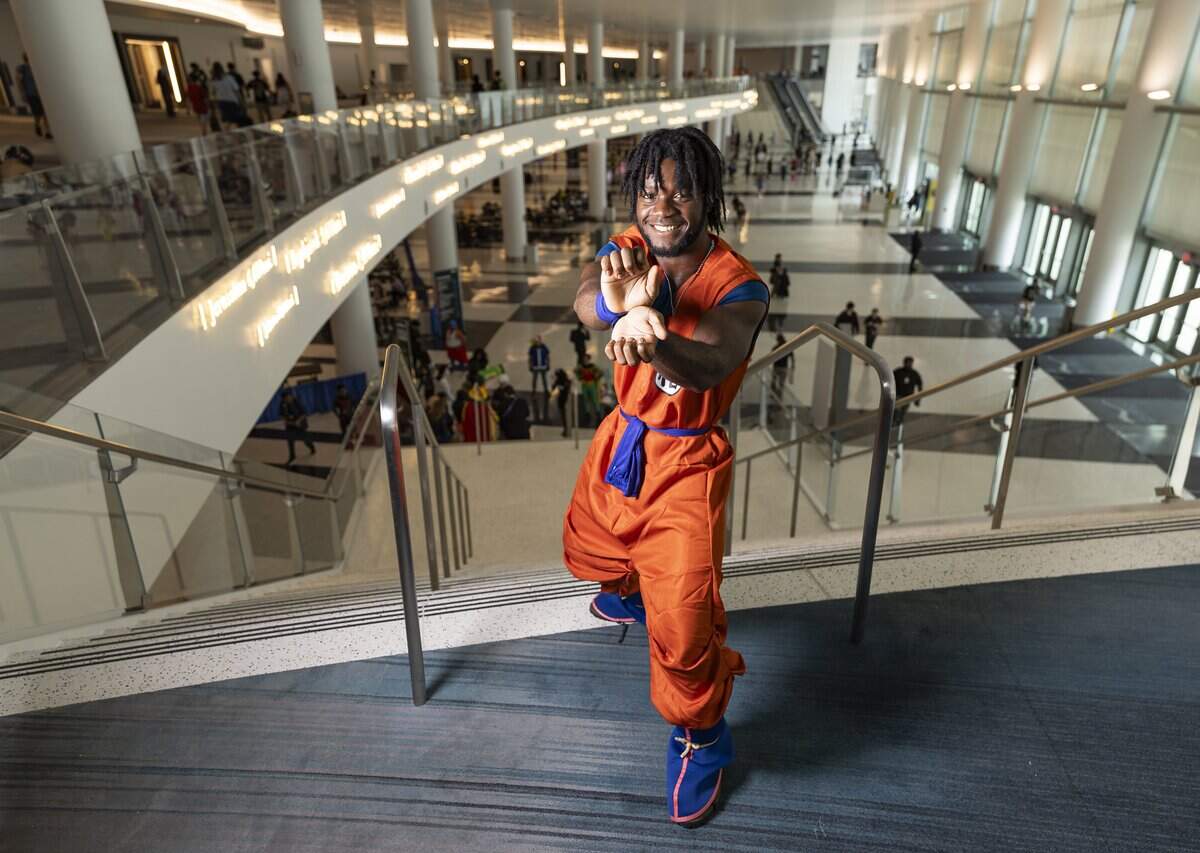 Noah Decembre cosplays as Goku from Dragon Ball Z during Florida Supercon 2026 at the Miami Beach Convention Center on Friday, July 10, 2026, in Miami Beach, Fla.