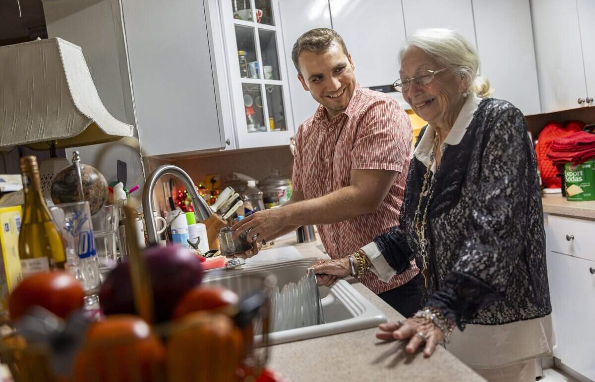 Alberto Rosales, 23, and his grandmother, Susie Rosales, 86, make coffee at their home on Friday, May 15, 2026, in Miami, Fla.
