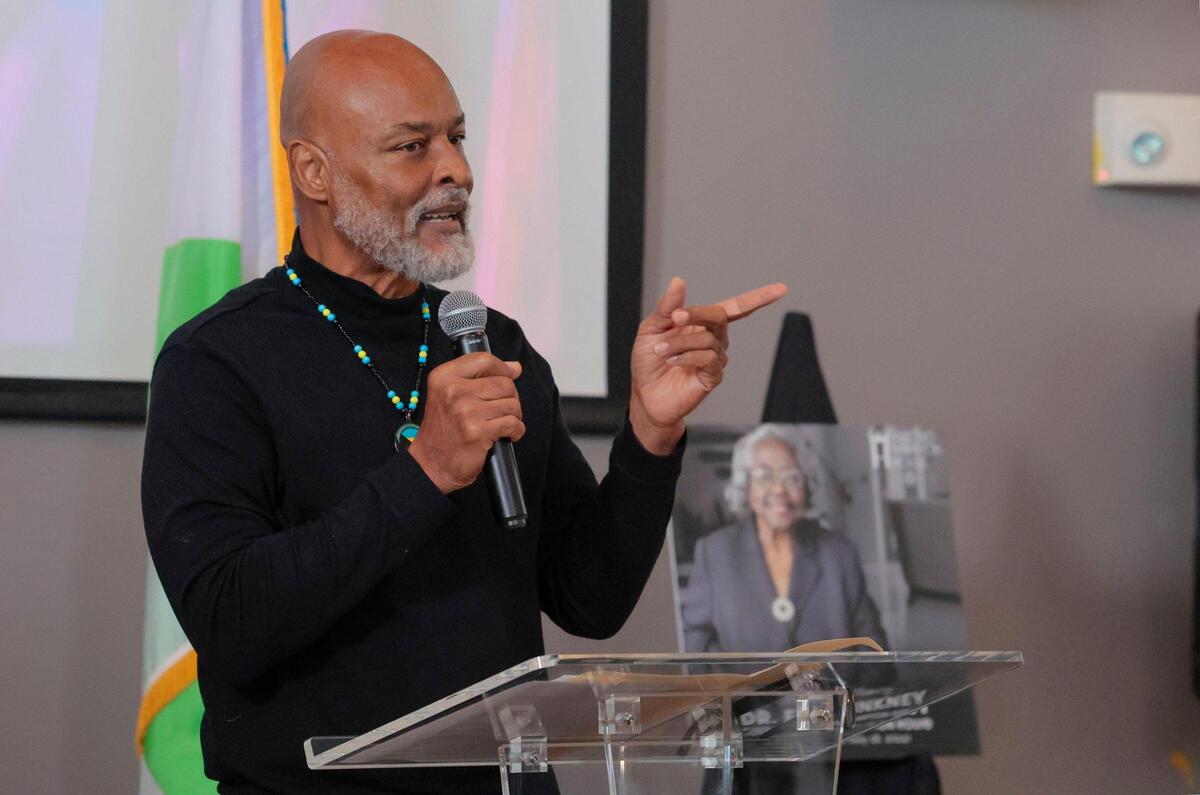 Gary Allen speaks during the street naming ceremony for his aunt, Enid Pinkney.