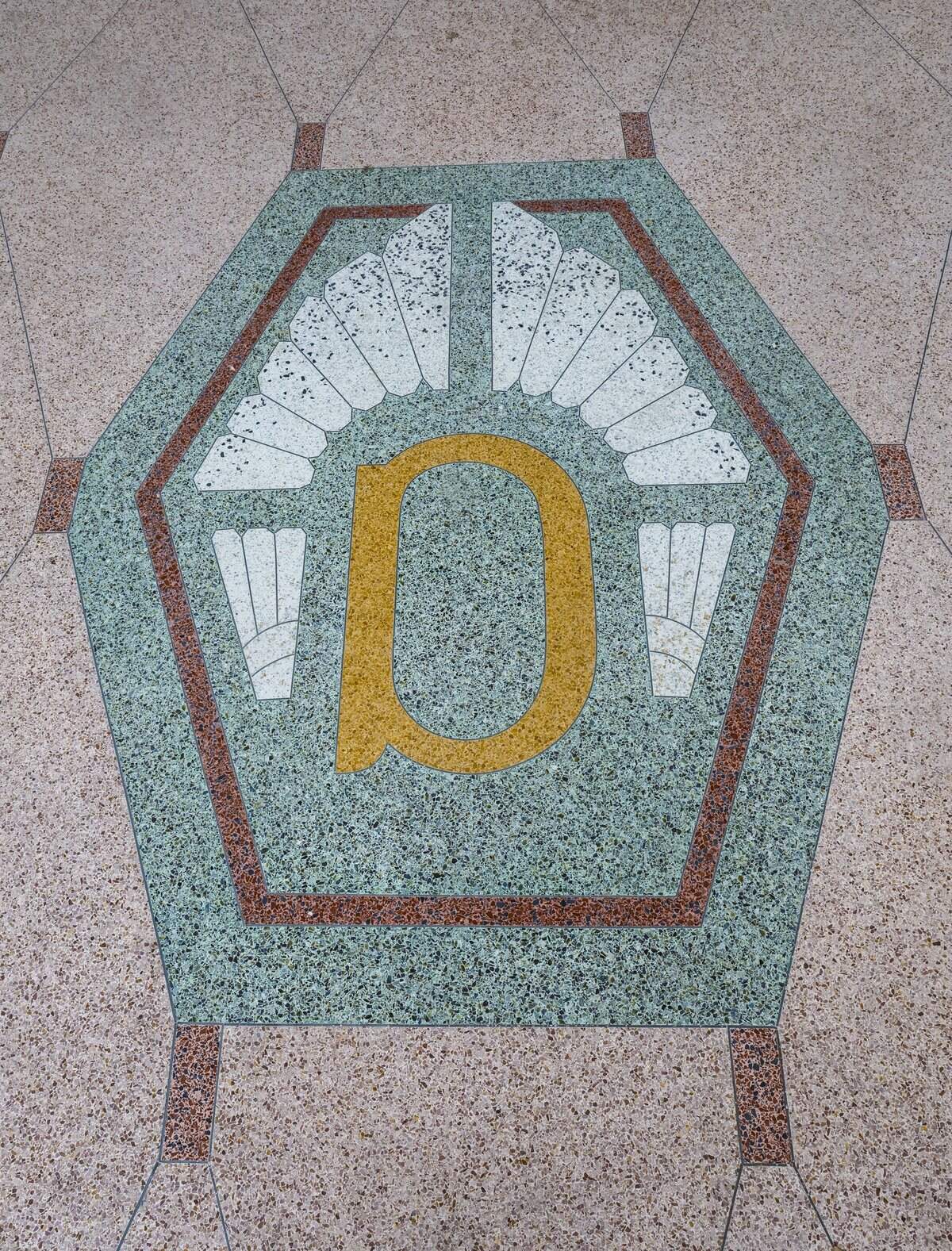 The seal of the Delano Miami Beach is embedded in the terrazzo floor and greets guests on arrival on Tuesday, May 5, 2026. The Delano will soon reopen to the public. The Art Deco hotel, first opened in 1947, was closed in 2020 for restoration.