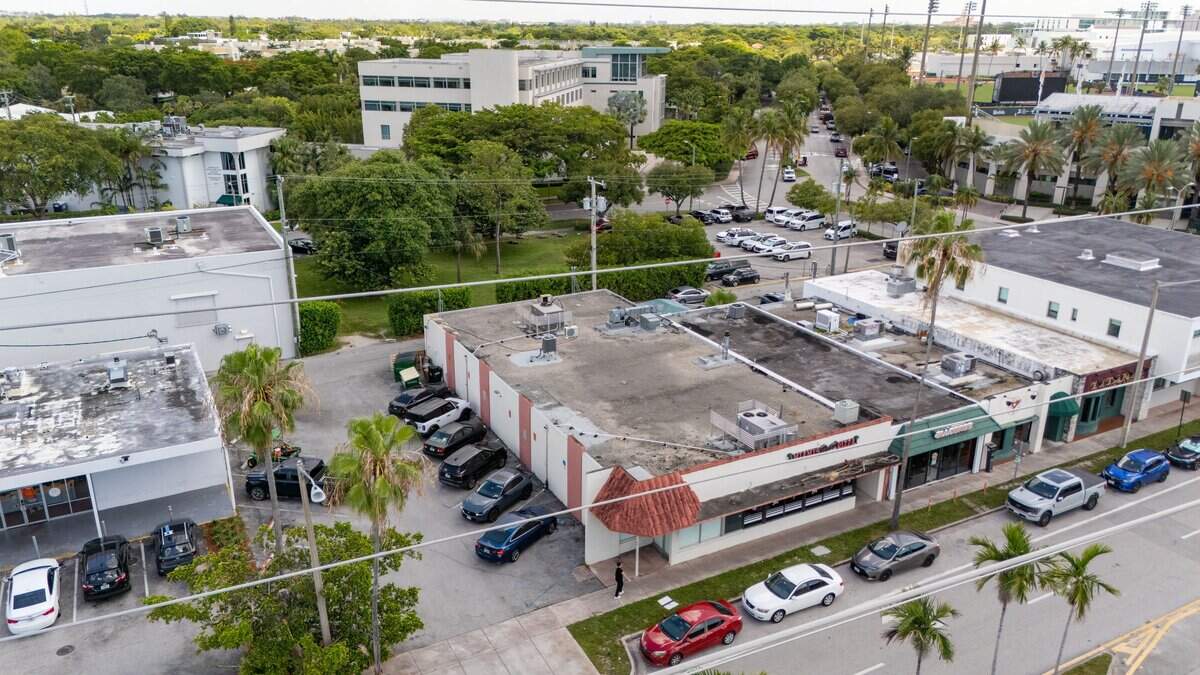 An aerial view of 530 Levante Avenue, 5827 Ponce de Leon Blvd, and 5835 Ponce de Leon Blvd in Coral Gables, Florida on Tuesday, June 30, 2026.These addresses are UM owned properties (they are next to the Titanic brewery restaurant). They will be rezoned as part of a deal with the City of Coral Gables that will expand UM's boundaries and make a new hospital possible in the future along the US.1 corridor.