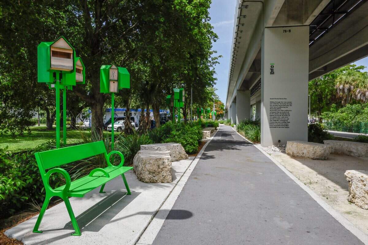 A sitting areas on the pedestrian trail sorrounded by native pollinator plants and bird houses along Mariposa Gardens at Segment 9 of The Underline on Tuesday, July 14, 2026 in Miami, Florida. The southernmost 7.36-mile phase extends from SW 65th Avenue to the Dadeland South Metrorail Station.