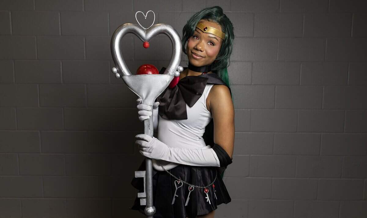 Maelyn Brown cosplays as Sailor Pluto from Sailor Moon during Florida Supercon 2026 at the Miami Beach Convention Center on Friday, July 10, 2026, in Miami Beach, Fla.