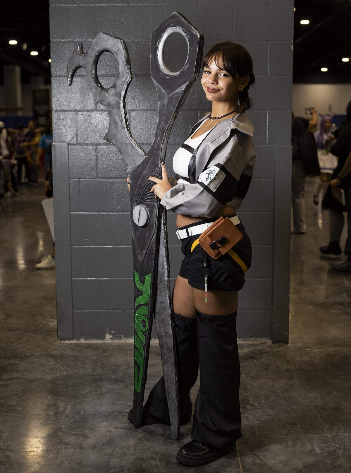 Brianna Galeano cosplays as Riyo Reaper from Gachiakuta during Florida Supercon 2026 at the Miami Beach Convention Center on Friday, July 10, 2026, in Miami Beach, Fla.