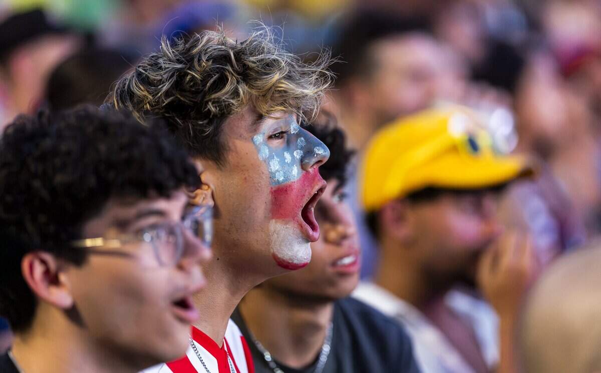 A United States fan cheers for his team during a watch party at the FIFA Fan Festival 2026 in Bayfront Park on Wednesday, July 1, 2026, in downtown Miami, Fla. The United States defeated Bosnia and Herzegovina 2-0 in their FIFA World Cup Round of 32 soccer match in Santa Clara, Calif.