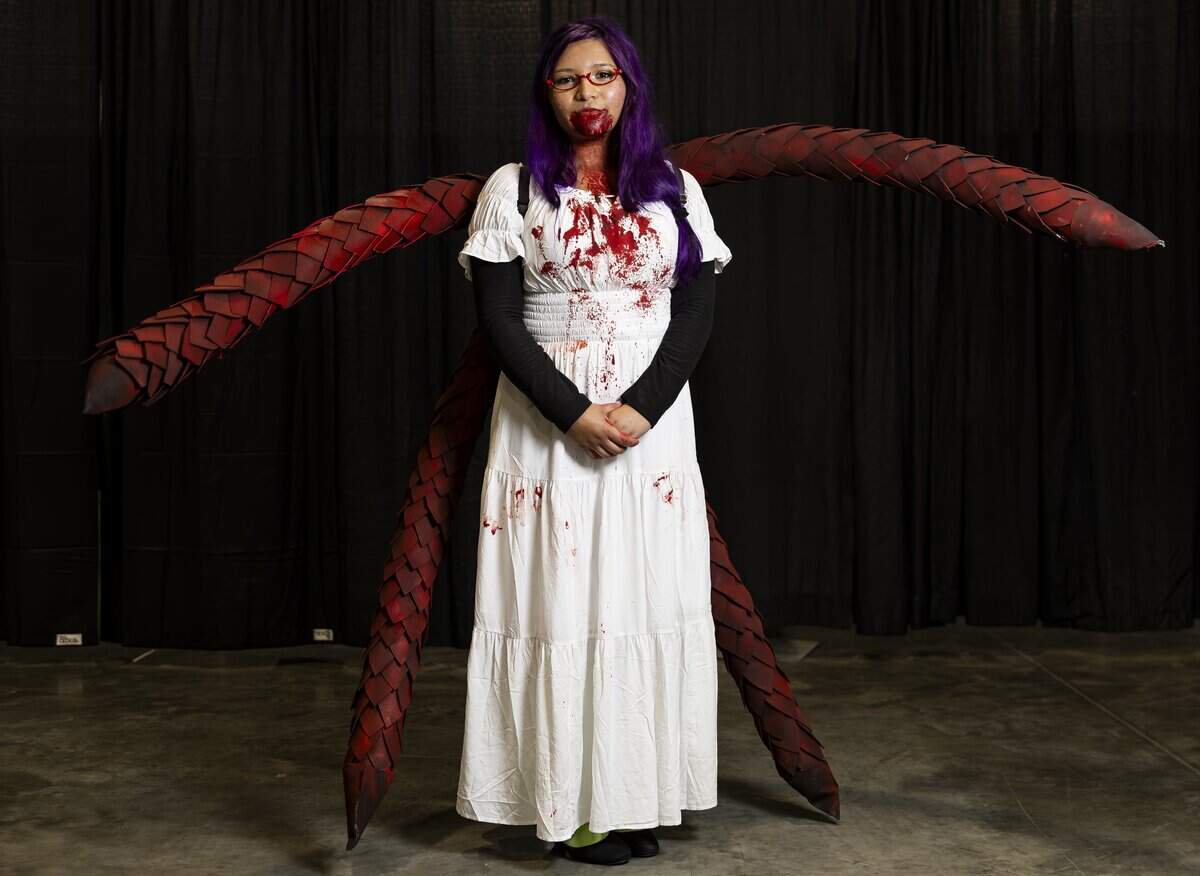 Angelita Izaguirre cosplays as Rize Kamishiro from Tokyo Ghoul during Florida Supercon 2026 at the Miami Beach Convention Center on Friday, July 10, 2026, in Miami Beach, Fla.
