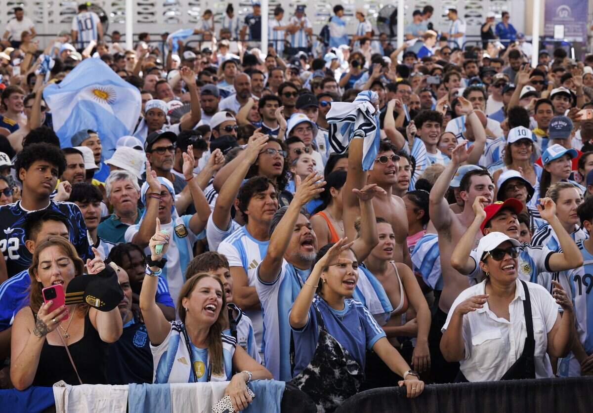 Fans cheer during a watch party for the 2026 FIFA World Cup Final between Argentina and Spain on Sunday, July 19, 2026, at the Miami Beach Bandshell in Miami Beach, Fla.
