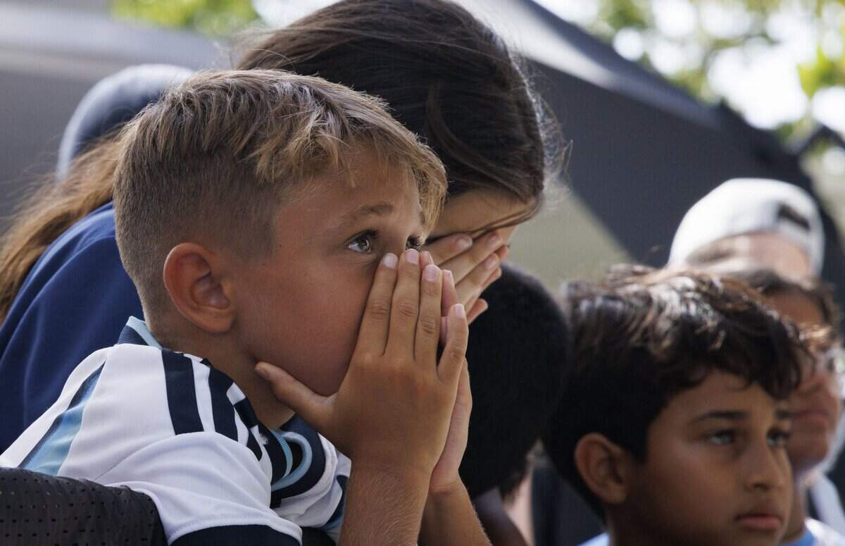 Argentina fans react to a call during a watch party for the 2026 FIFA World Cup Final on Sunday, July 19, 2026, at the Miami Beach Bandshell in Miami Beach, Fla. Spain won against Argentina 1-0 in extended time.