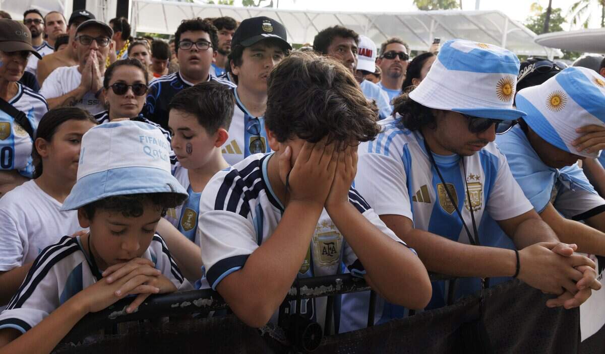 Argentina fans react to Spain scoring a goal during a watch party for the 2026 FIFA World Cup Final on Sunday, July 19, 2026, at the Miami Beach Bandshell in Miami Beach, Fla.