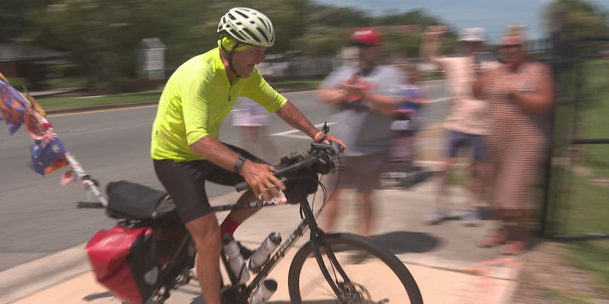 Leon tennis coach Kevin Record returns home from worldwide bike trip