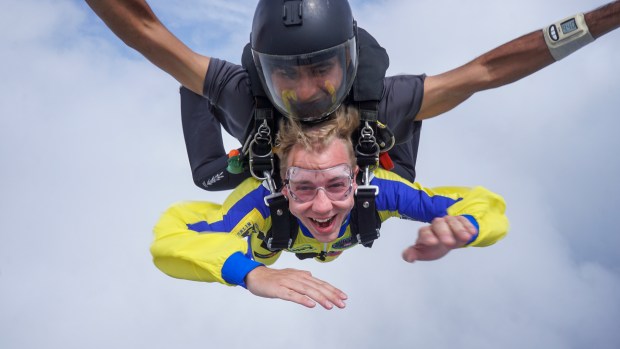 Central Florida Explorer Patrick Connolly flies through the air while skydiving with the help of tandem instructor Carlos Cribas at Skydive DeLand. (Patrick Connolly/Orlando Sentinel)