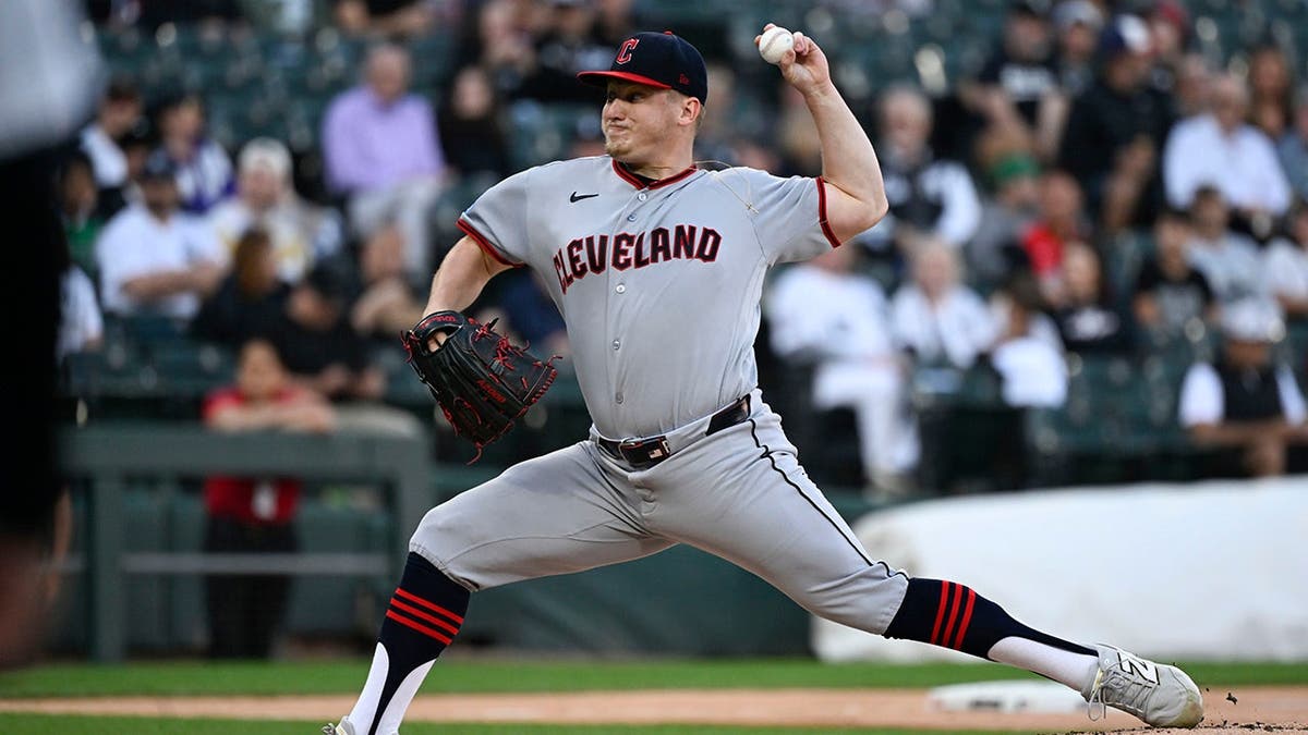 Cleveland Guardians pitcher Parker Messick (77) delivers the ball during the first inning against the Chicago White Sox at Rate Field.