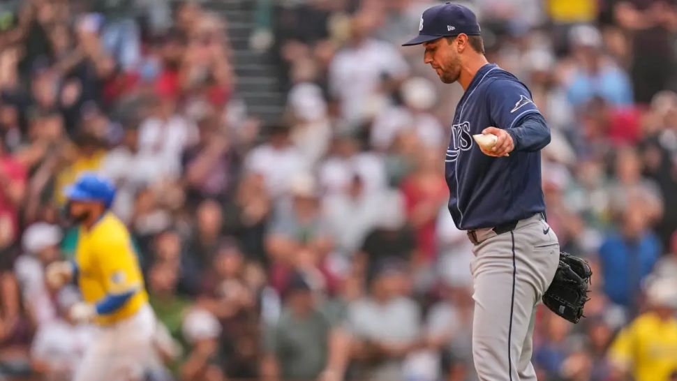 Tampa Bay Rays' Ian Seymour, right, prepares for the next batter as Boston Red Sox's Wilyer Abreu, back left, rounds the bases on a solo home run in the third inning of a baseball game, Saturday, July 18, 2026, in Boston. (AP Photo/Charles Krupa)