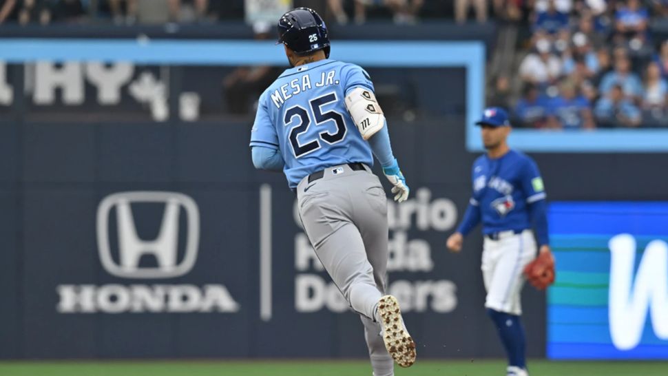 Tampa Bay Rays' Victor Mesa Jr. (25) runs the bases after hitting a solo home run against the Toronto Blue Jays during the second inning of a baseball game in Toronto, Monday, July 20, 2026. (Jon Blacker/The Canadian Press via AP)