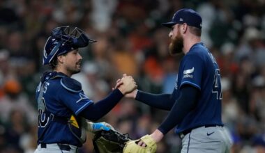 Tampa Bay Rays catcher Nick Fortes and pitcher Bryan Baker celebrate after a baseball game against the Houston Astros, Friday, July 3, 2026, in Houston. (AP Photo/Kevin M. Cox)
