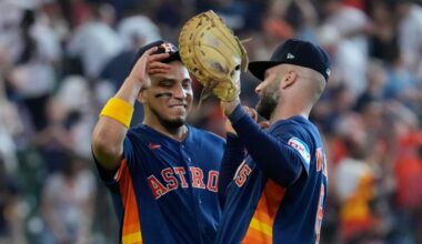 Houston Astros' Isaac Paredes, left, and Christian Walker celebrate after a baseball game against the Tampa Bay Rays Sunday, July 5, 2026, in Houston. (AP Photo/David J. Phillip)