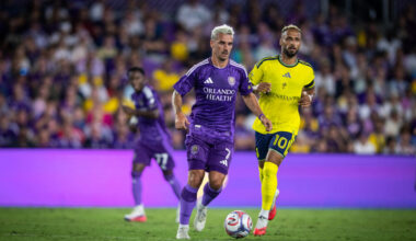 Image of Antoine Griezmann dribbling the ball past Hany Mukhtar of Nashville.