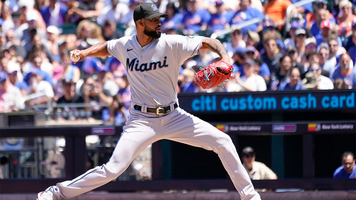 Miami Marlins pitcher Sandy Alcantara delivers against the New York Mets during the first inning of a baseball game, Sunday, July 10, 2022, in New York.
