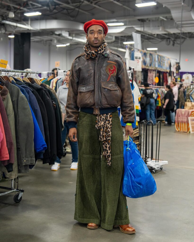 person posing on vintage clothing