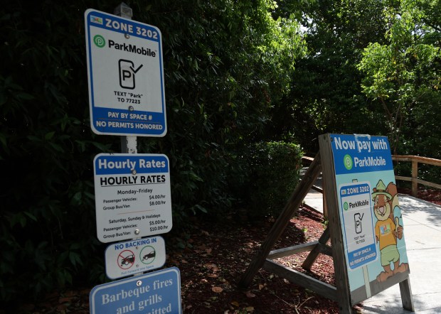 Signage at the South Inlet Park parking lot is seen on Sunday, June 28, 2026, in Boca Raton. (Joe Cavaretta/South Florida Sun Sentinel)