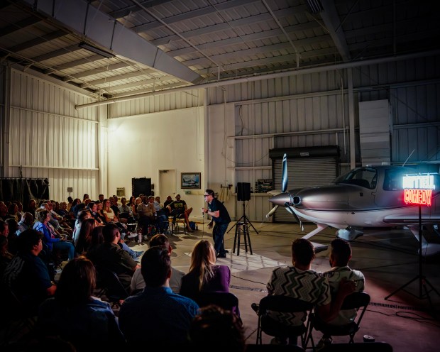 South Florida comedian Brian Coronado brings the laughs during a Don't Tell Comedy show in an airplane hangar in Pompano Beach. (DART Vision/Courtesy)