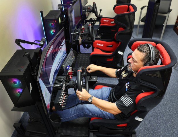 Agurto takes part in an adrenaline therapy research for veterans, where veterans turn to heartbeat-increasing activities such as racecar driving to help with their PTSD on Wednesday. (Carline Jean/South Florida Sun Sentinel)
