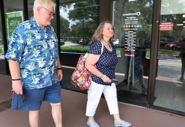 Vicki and Mark Rethemeyer walk to Casa Marin Cocina Mexicana in Plantation on Friday, July 10, 2026. The Rethemeyers bring their own to-go containers for leftovers. (Carline Jean/South Florida Sun Sentinel)