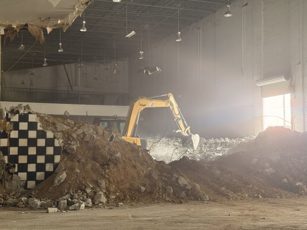Demolition crews dismantle the interior structures of the former Vans Skatepark on June 3, 2026, clearing the way for the construction of Smash Point Club Orlando. (Photo: Sarah Kinbar)