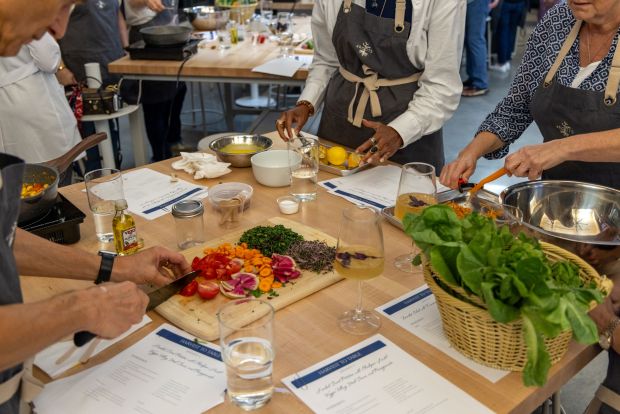 Guests at 4Roots Farms' Harvest Table events enjoy the hands-on experience of preparing and enjoying their meals while learning about where their food comes from as well as its nutritive benefits. (Photo courtesy 4Roots Farm Campus)