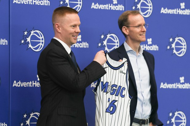 New Orlando Magic head coach Sean Sweeney and Magic president Jeff Weltman during a press conference at the AdventHealth Training Center on Thursday, June 18, 2026. Sweeney was introduced as the new head coach of the Magic. (Barrett Walsh/Orlando Sentinel)