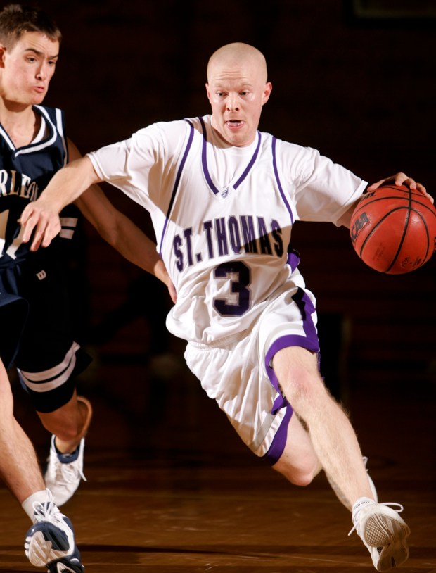 Former St. Thomas men's basketball player Sean Sweeney (3) during a game against Carleton College November 30, 2005 at Schoenecker Arena. (Courtesy of St. Thomas Athletics)