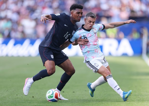 Alex Freeman #16 of the United States competes for the ball against Leandro Trossard #10 of Belgium during the FIFA World Cup 2026 Round of 16 match between USA and Belgium at Seattle Stadium on July 06, 2026 in Seattle, Washington. (Photo by Carl Recine/Getty Images)